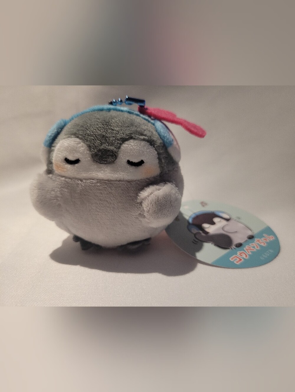 NWT Koupen-Chen Gray Plush Penguin Mascot with Blue Headphones